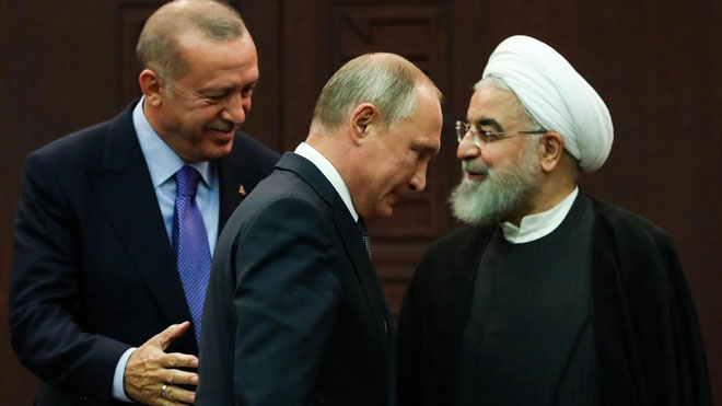 Tổng thống Thổ Nhĩ Kỳ Recep Tayyip Erdogan (trái), Tổng thống Nga Vladimir Putin (giữa) và người đồng cấp Iran Hassan Rouhani gặp gỡ tại Ankara ngày 16-9. Ảnh: AFP