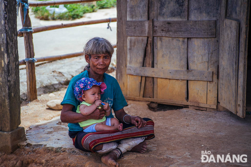 Villagers suffering from a severe lack of clean water and electricity