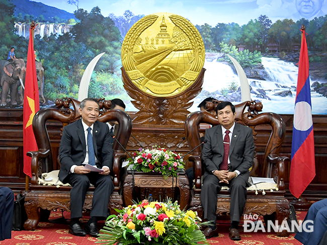Secretary Nghia (left) and Governor of Salavan Province Sisuvan Vongchomsy