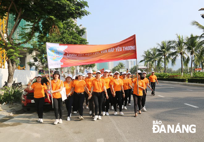 … local women parading along local main streets to promote gender equality and women's empowerment