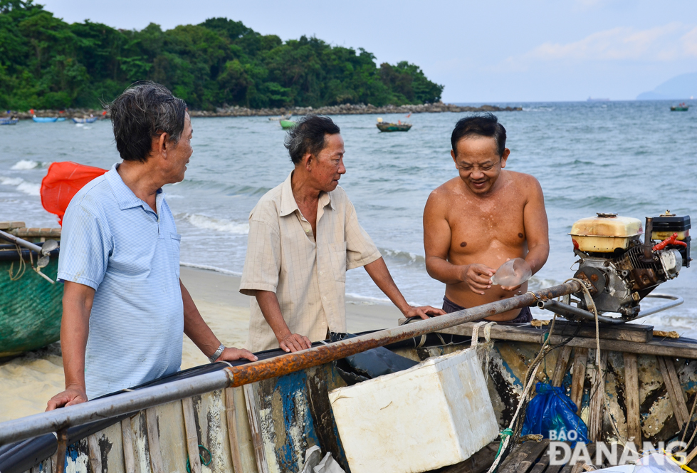 Engine-powered coracles are a means of livelihood for Nam O villagers