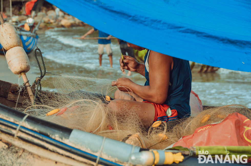 Locals are seen preparing fishing gears for their fishing trips