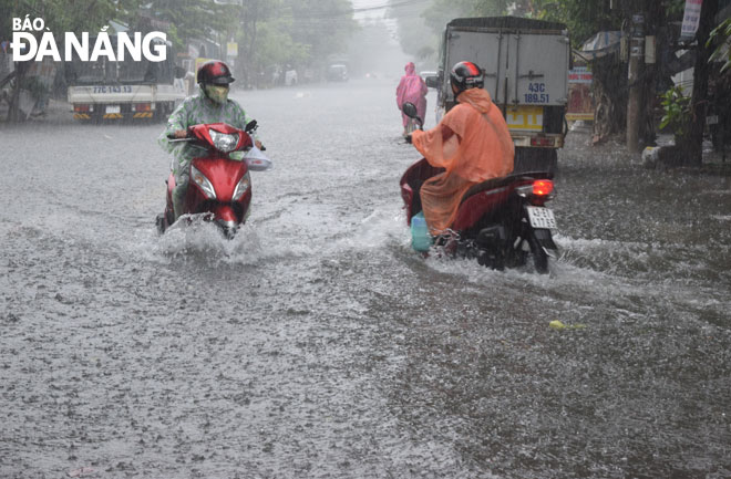 A heavily flooded section of Le Tan Trung Street