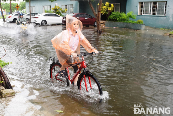 A section of Bui Duong Linh being submerged in floodwater of over 20cm