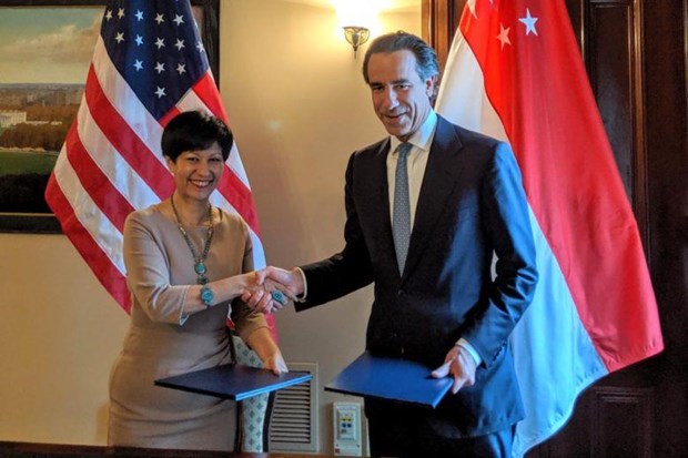 The agreement is signed in Washington, DC, by Singaporean Minister in the Prime Minister's Office Indranee Rajah and US Deputy Treasury Secretary Justin Muzinich. (Photo: Singaporean Ministry of Finance)