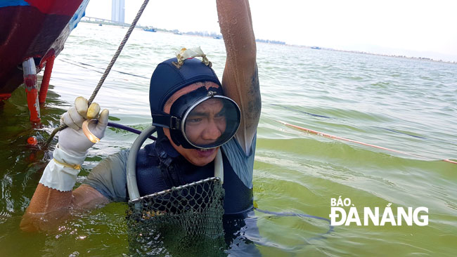 A diver resting on the water after an hour of underwater diving 