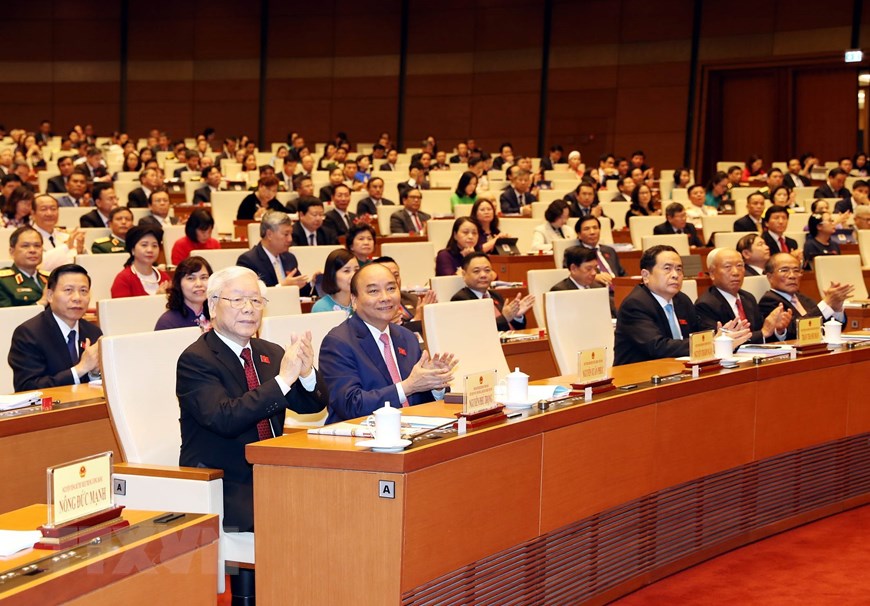  Tổng Bí thư, Chủ tịch nước Nguyễn Phú Trọng, Thủ tướng Nguyễn Xuân Phúc, nguyên Chủ tịch Quốc hội Nguyễn Văn An, Nguyễn Sinh Hùng dự phiên khai mạc. (Ảnh: Trọng Đức/TTXVN)