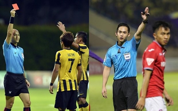 Singapore's Foo Chuan Hui (left) and Nathan Chan Rong De will referee two V.League matches this weekend. — (Source: vov.vn)