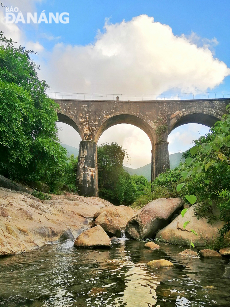 At the pier of the bridge is a stream of cold, clear water.