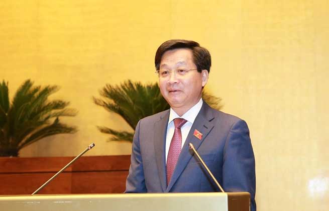 Tổng Thanh tra Chính phủ Lê Minh Khái, thừa ủy quyền của Thủ tướng Chính phủ trình bày Báo cáo về công tác phòng, chống tham nhũng năm 2019. (Ảnh: Doãn Tấn/TTXVN)