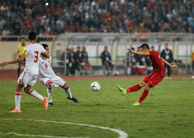 Nguyen Tien Linh (in red) in action (Photo: VNA)