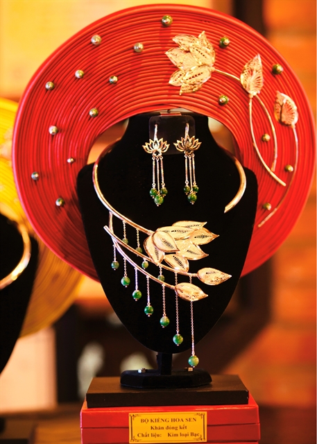 lotus shaped necklace created by an artist from Huế. An exhibition of 100 traditional jewellery items will be held at the Đà Nẵng Fine Arts Museum on November 22-25. — Photo courtesy Đà Nẵng Fine Arts Museum  Read more at http://vietnamnews.vn/life-style/548820/cultural-activities-to-celebrate-heritage-day.html#CAJkrmesYOb3iGm4.99