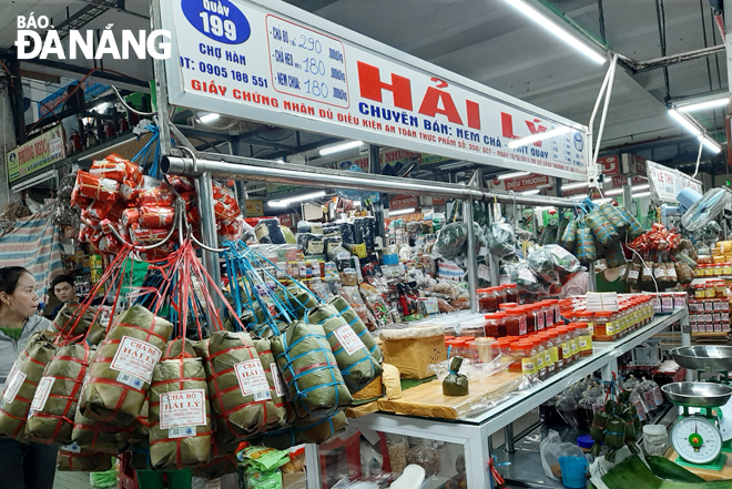 Many supermarkets and other retailers across Da Nang are busy preparing for Tet goods for buyers