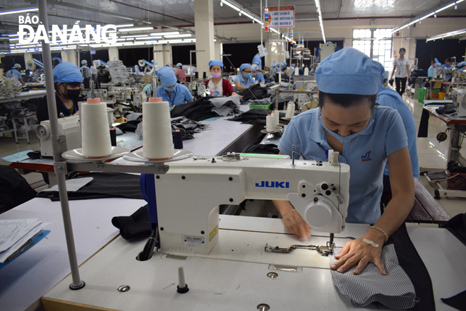 The city’s garment production is expected to have gone up by 21.3% by late this year. The bustling atmosphere being reported at the city-based Hoa Tho Textiles and Garments Corporation