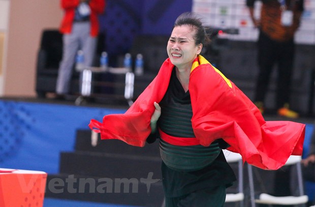 Trần Thị Thêm giành HCV đầu tiên cho Pencak silat. (Ảnh: Vietnam+)