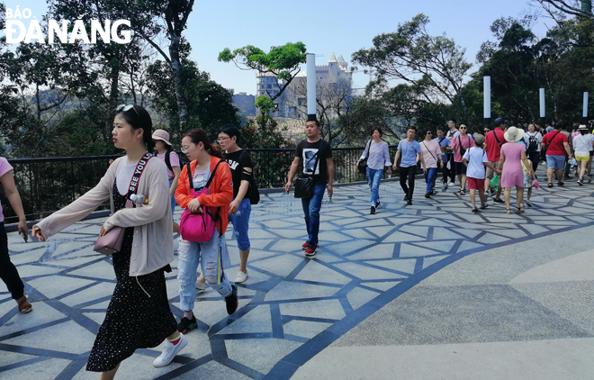 Tourists are seen visiting the popular Sun World Ba Na Hills 