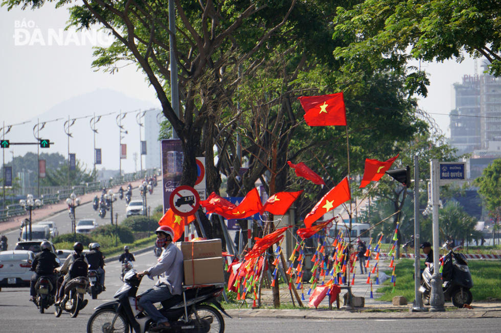 National flags of all forms - T-shirts, banners, stickers, have been selling like hot cakes all across the city streets.