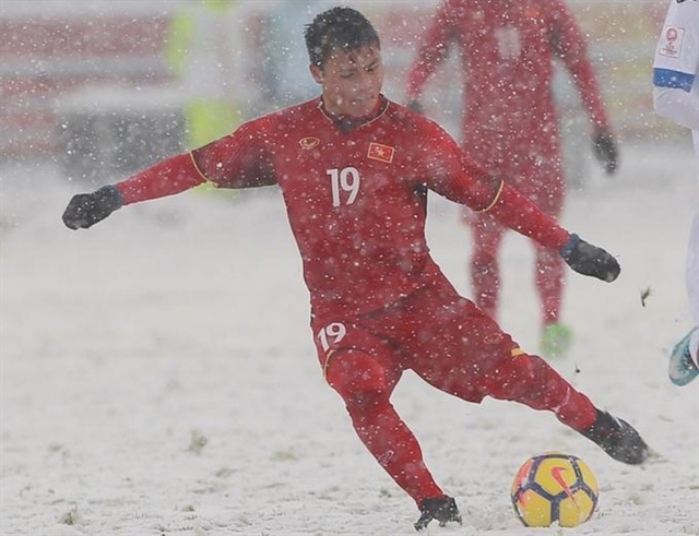 Vietnamese midfielder Nguyễn Quang Hải seen at the AFC U23 Championship 2018.— Photo baomoi.com Read more at http://vietnamnews.vn/sports/569881/hais-goal-in-the-snow-selected-as-one-of-eight-iconic-strikes-at-afc-u23-champs.html#PUz3uf5xSIxBgMTb.99