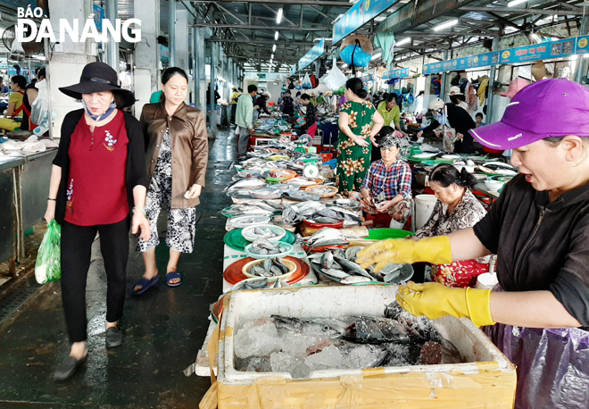 Shoppers at the Moi Market