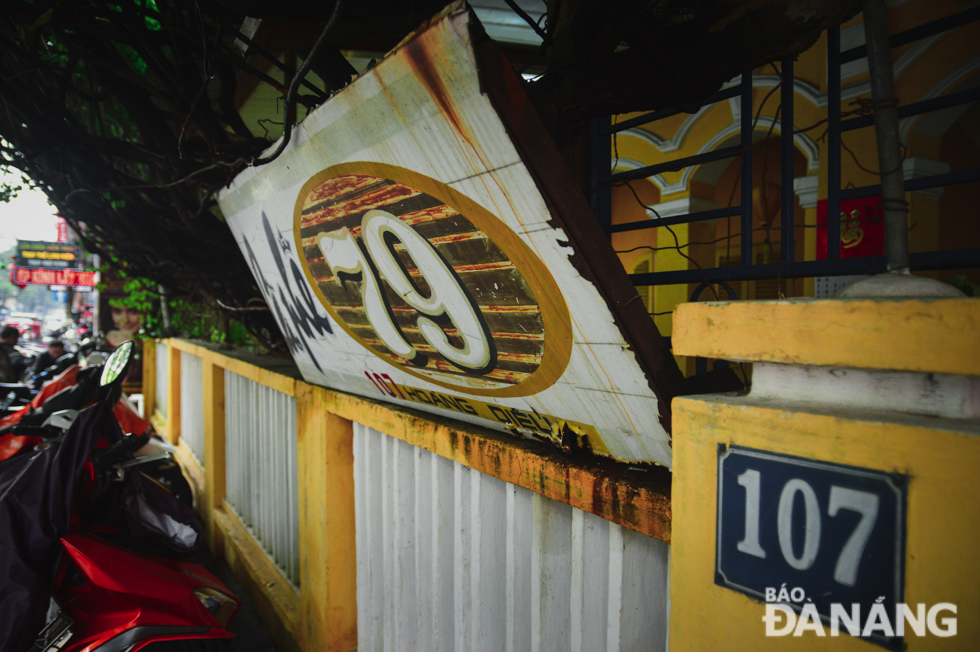 The shop’s rusty and worn signboard