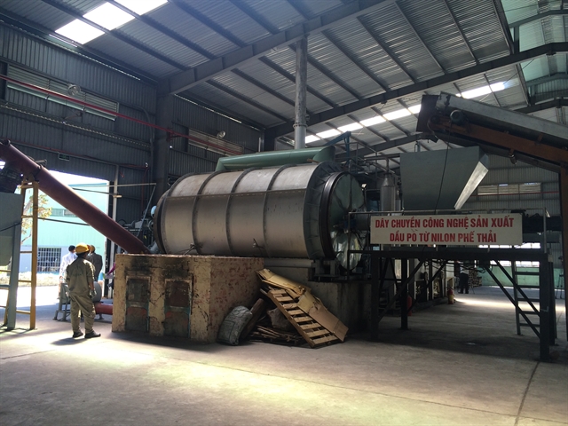 A production line at a waste treatment plant at Khanh Son Dump in Da Nang.