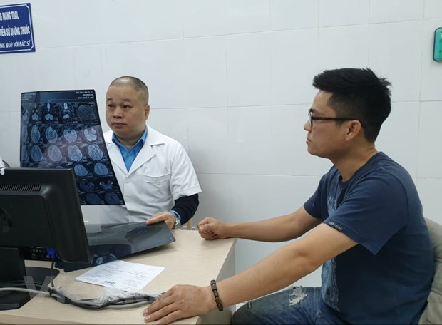 Bệnh nhân khám bệnh liên quan tới tai biến mạch máu não tại Bệnh viện Hữu nghị Việt Đức. (Ảnh: T.G/Vietnam+)