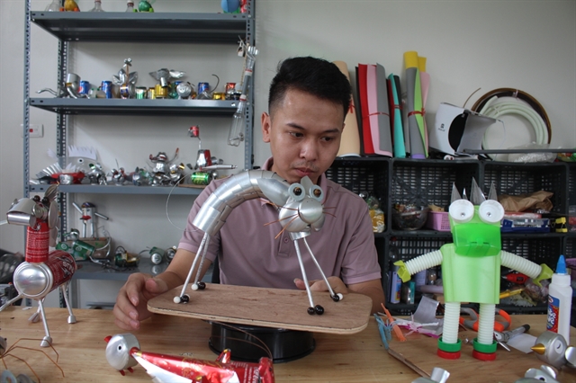 Nghia has created hundreds of toys from recyclable materials like old plastic bottles and cans.