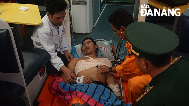 Doctors from the city’s Emergency Centre 115 giving initial first aid to the injured fisherman