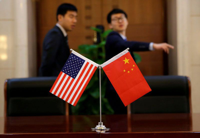 Thỏa thuận giai đoạn 1 chưa đủ để giải quyết các bất đồng trong thương mại Mỹ-Trung. Ảnh: Reuters