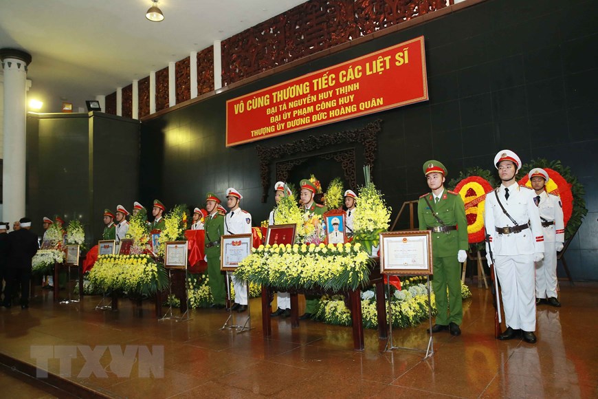 Lễ tang 3 liệt sỹ Công an nhân dân hy sinh tại Đồng Tâm được tổ chức trọng thể tại Nhà tang lễ Quốc gia. (Ảnh: Doãn Tấn/TTXVN)