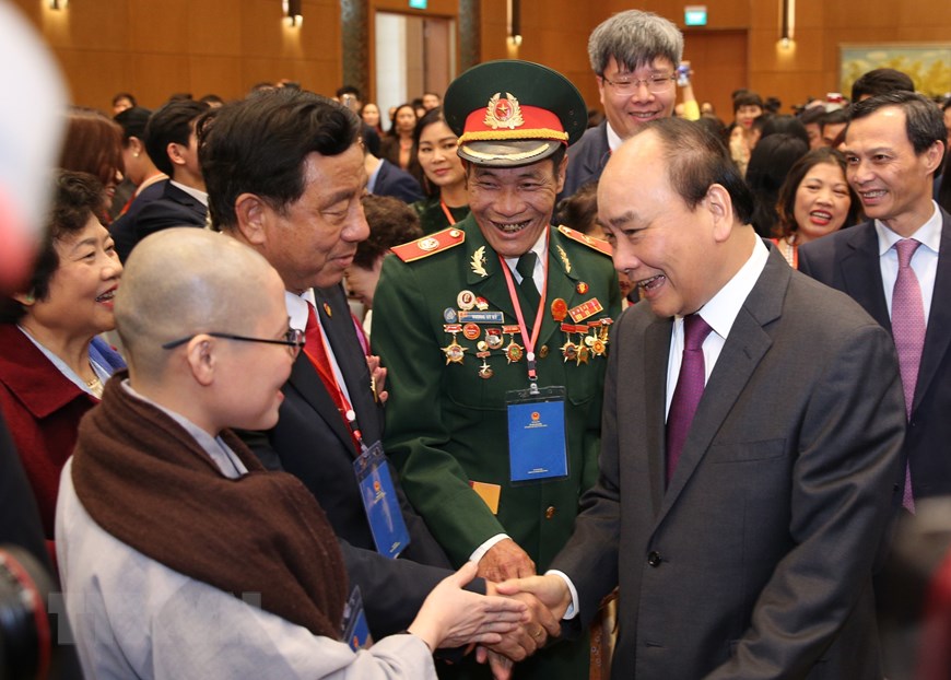 Thủ tướng Nguyễn Xuân Phúc với các đại biểu. (Ảnh: Dương Giang/TTXVN)
