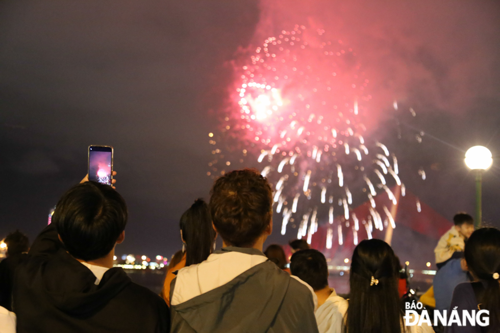 Residents and tourists watching the fireworks