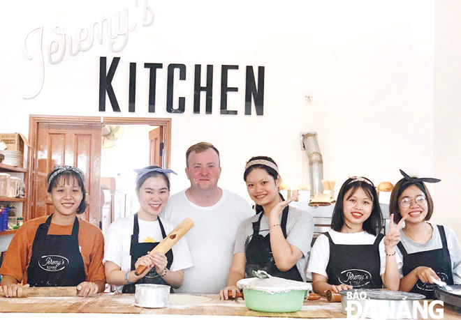 Jeremy Smith (3rd left) and his young and energetic baking staff at the Jeremy’s Kitchen