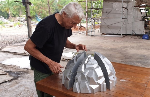 French sculptor Ariel Moscovici works on his sculpture in the frame work of the the Art in the Forest project. (Photo courtesy of the artist)