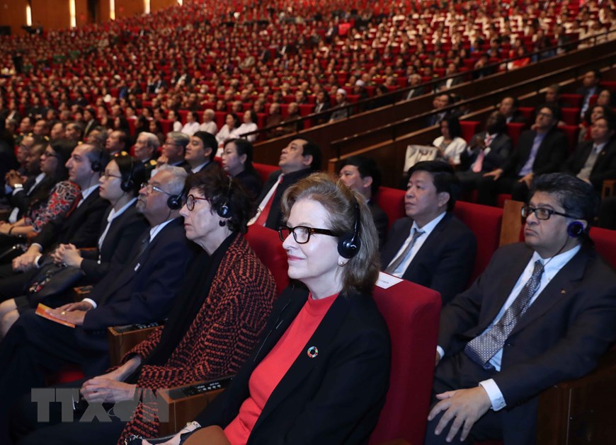 Các đại biểu quốc tế dự Lễ kỷ niệm 90 năm Ngày thành lập Đảng Cộng sản Việt Nam. (Ảnh: Thống Nhất/TTXVN)