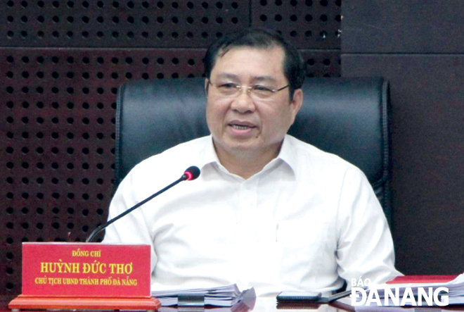 Chủ tịch UBND thành phố Huỳnh Đức Thơ phát biểu chỉ đạo tại phiên họp thường kỳ của UBND thành phố vào chiều 5-2. Ảnh: T.HÙNG