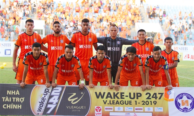 SHB DN squad pose for photo before a match in the national football championship, V.League1. All players was on strict medical check as the team were cautions on Coronavirus infection. 