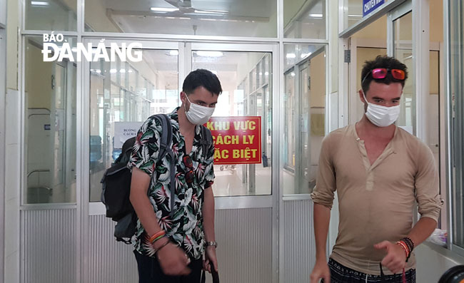 Foreigners visiting their relatives who are kept in quarantine at the city’s Lung Hospital