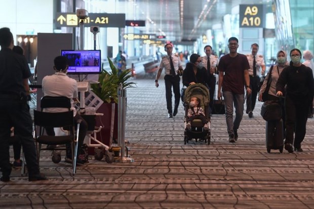 Travellers arrive at Changi Airport Terminal 3 on February 14, 2020. (Photo: straitstimes.com)