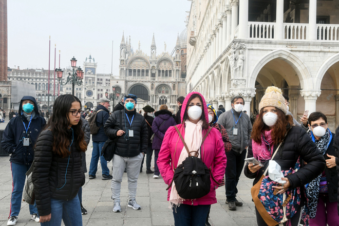 Khách du lịch tại thành phố Venice, Ý.  		                    Ảnh: AFP/Getty Images