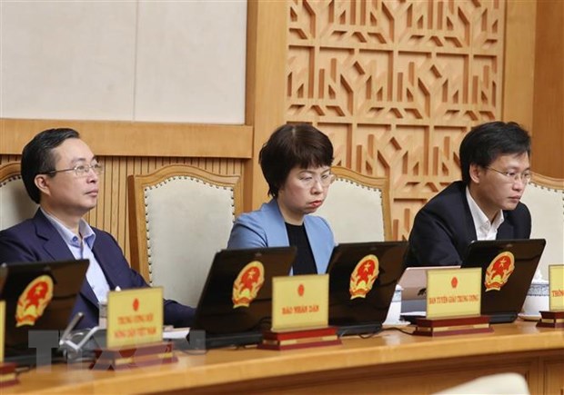 Thành viên Chính phủ và khách mời dự phiên họp Chính phủ thường kỳ tháng 2. (Ảnh: Thống Nhất/TTXVN)