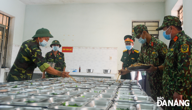 The centre's soldiers preparing for meals for the isolated 