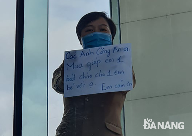 A hotel female guest sending a message requesting help from police officers who are on duty outside the hotel to deliver a bowl of porridge to her baby