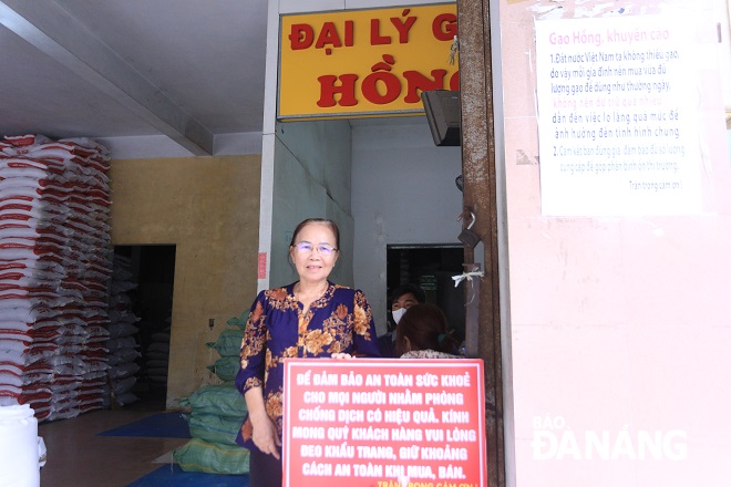 Mrs Hong at her rice selling store