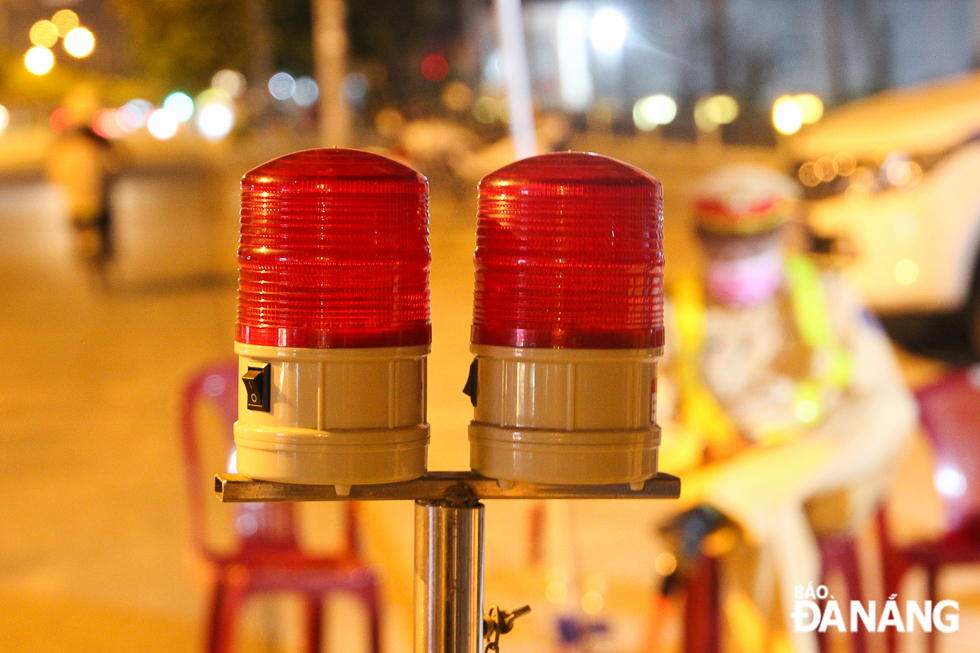 Red warning lights at checkpoints