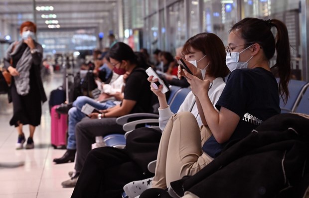 People in the Philippines wear facemasks to prevent the spread of coronavirus. (Photo: AFP/VNA)