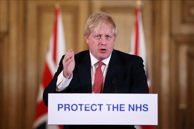 Thủ tướng Anh Boris Johnson phát biểu tại London ngày 22-3. Ảnh: AFP/TTXVN
