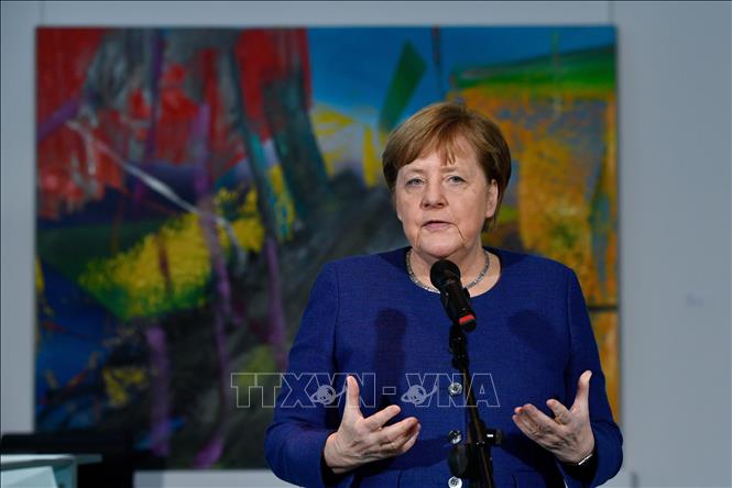 Thủ tướng Đức Angela Merkel phát biểu tại cuộc họp về ảnh hưởng của dịch COVID-19 tới kinh tế và xã hội ở Berlin ngày 13-3. Ảnh: AFP/TTXVN