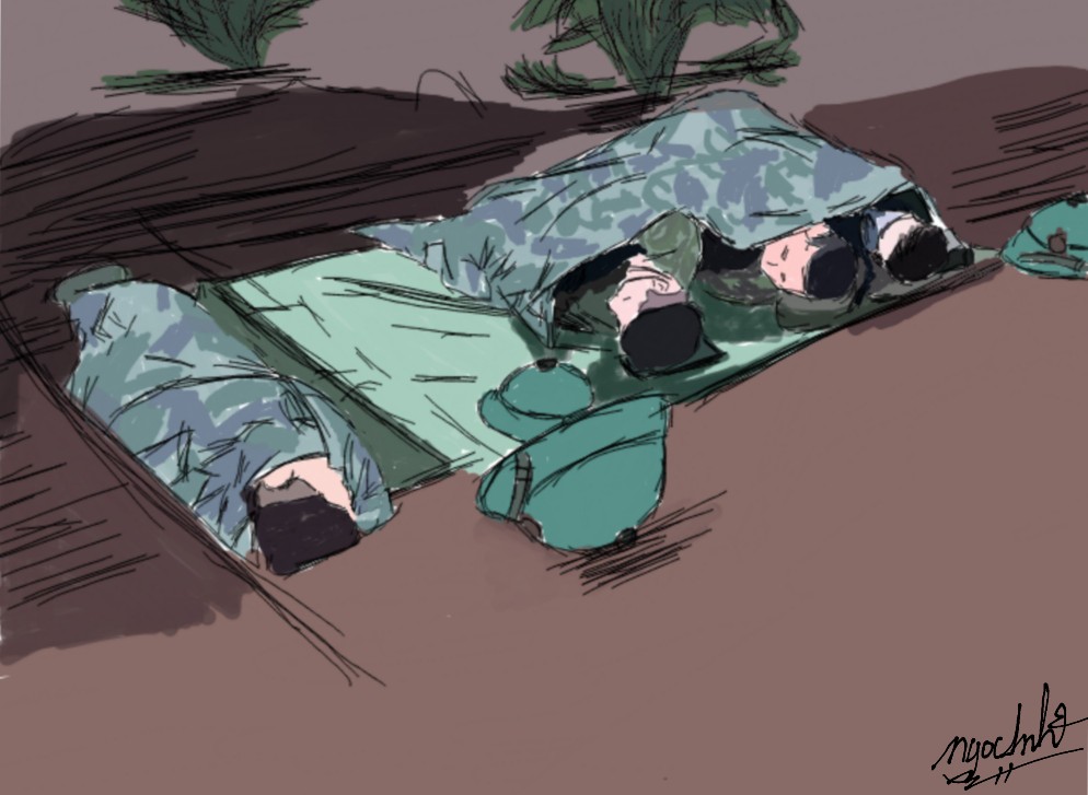 Some military personnel sleeping outdoors on thin mats or carton sheets