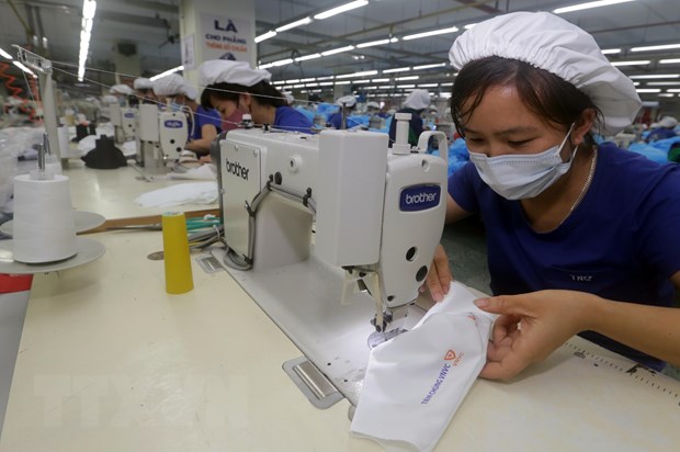Covid-19 cũng là cơ hội cho các doanh nghiệp dệt may Việt Nam. (Ảnh: TTXVN)